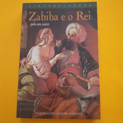 Capa de livro Zabiba e o Rei com ilustração de homem e mulher sentados