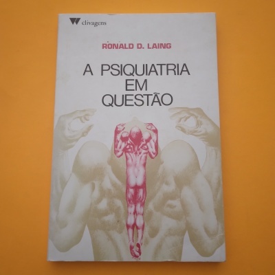 Capa de livro 'A PSIQUIATRIA EM QUESTÃO' com ilustração artística de figuras humanas