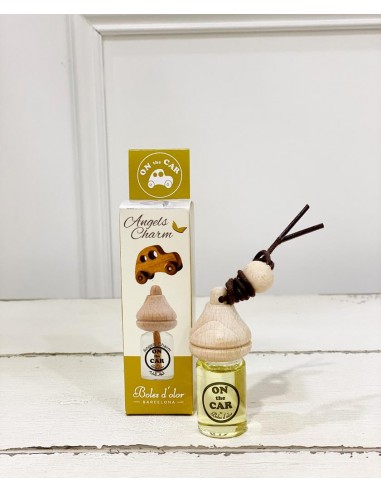 Perfume para carro Boles d'olor com frasco de vidro amarelo e tampa de madeira clara