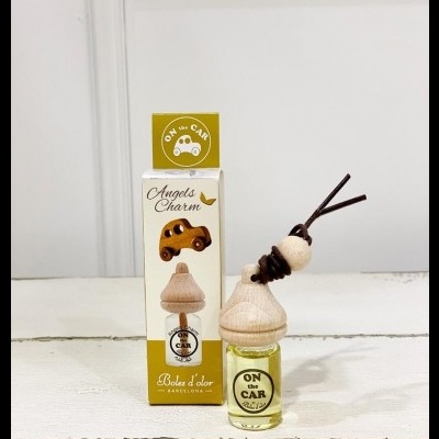 Perfume para carro Boles d'olor com frasco de vidro amarelo e tampa de madeira clara