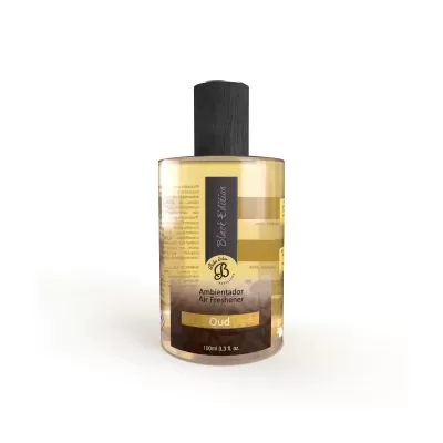 Frasco de ambientador Oud com rótulo cinzento e dourado e tampa preta