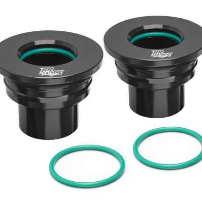 Peças cilíndricas pretas com anéis verdes e texto RR EXTREME