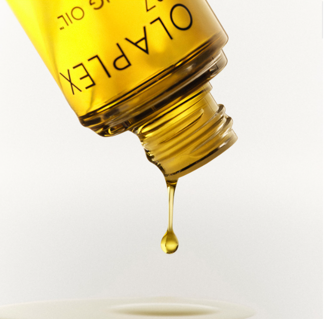 Olaplex Nº7 – Óleo Reparador, Fortalecedor e Protetor 30ml Garrafa amarela de óleo OLAPLEX a pingar