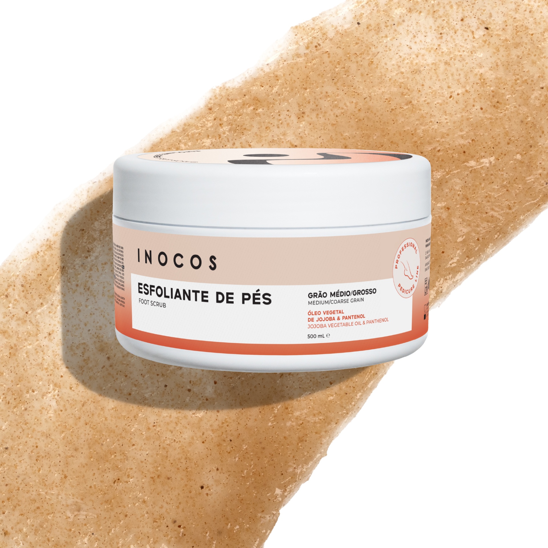 Esfoliante de Pés INOCOS 500ml Frasco branco de esfoliante de pés Inocos com rótulo bege e laranja, em fundo branco e textura de esfoliante.