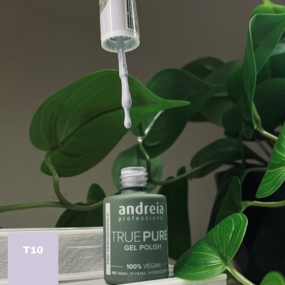 Frasco verde de verniz em gel com conta-gotas a formar gota, plantas verdes ao fundo