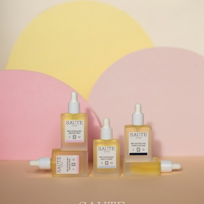 Frascos de óleo para cutículas SAUTE CARE em vidro fosco com conta-gotas em fundo colorido