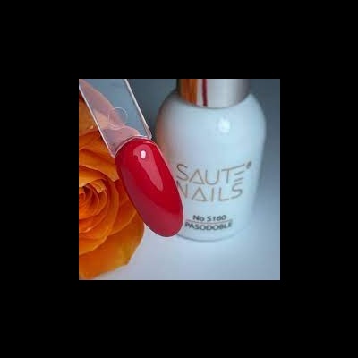 Verniz de unhas branco com amostra de cor vermelha e flor laranja