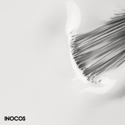 Preços artificiais transparentes em suporte branco com o texto INOCOS no canto