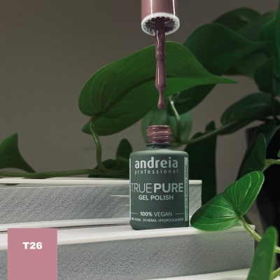 Frasco de verniz gel Andreia Professional rosa nude com planta ao fundo