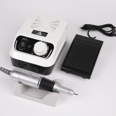 unidade de manicure elétrica com pedal e ferramenta sobre base