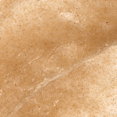 Superfície castanho claro texturada com manchas e brilho