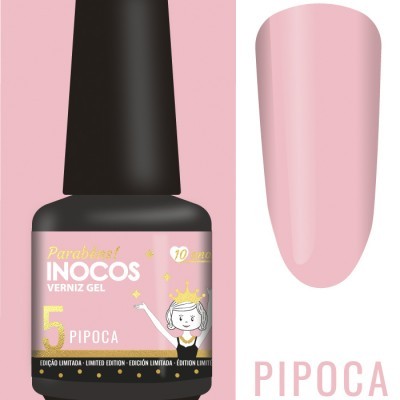 Frasco de verniz gel rosa com rótulo cor-de-rosa e amostra de cor semelhante