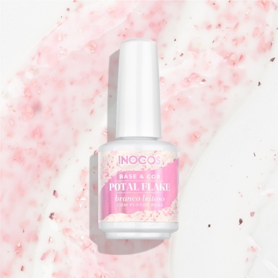 Frasco de verniz para unhas branco leitoso com flocos rosas em fundo branco com manchas rosas