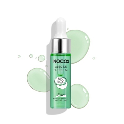 Frasco verde de óleo de cutículas da INOCOS com conta-gotas e gotas do produto em fundo branco