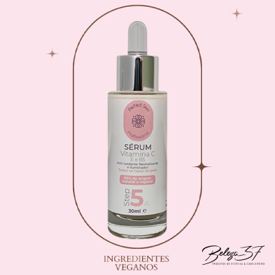 Frasco de sérum Vitamina C com conta-gotas em fundo rosa e moldura dourada