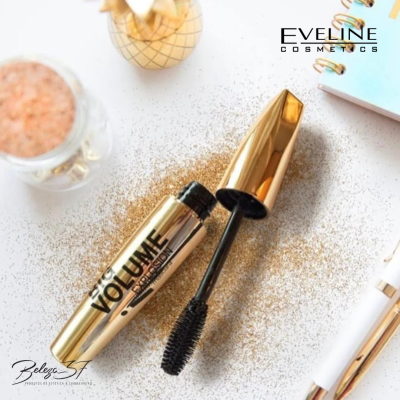 Máscara de pestanas dourada com aplicador e glitter ao redor