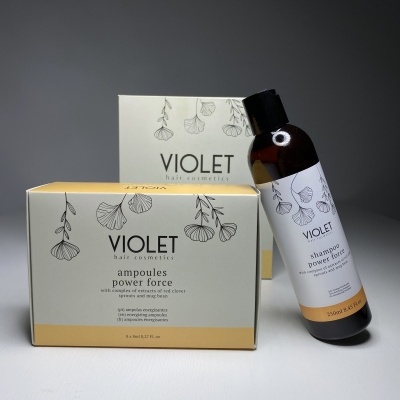 Produtos VIOLET hair cosmetics com embalagem creme e amarelo decorada com folhas e textos