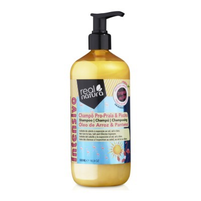 Garrafa amarela com doseador preto e rótulo informativo de champô Real Natura Intensivo
