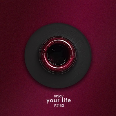 Objeto circular negro com interior vermelho e texto enjoy your life P2160 em fundo vermelho