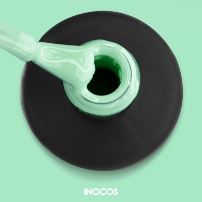 Frasco de verniz para unhas verde menta aberto com pincel