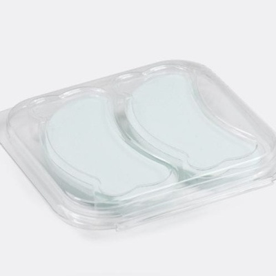 Par de almofadas de gel azul claro em embalagem plástica transparente