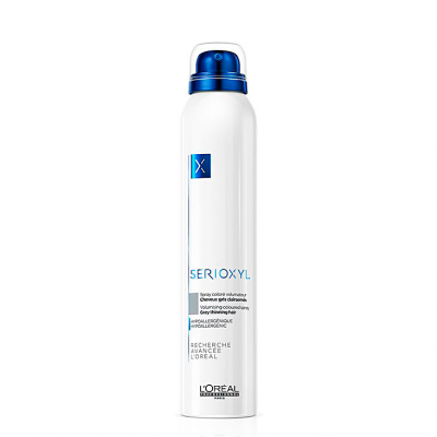 Frasco branco e azul de spray L'Oréal SERIOXYL para volume capilar