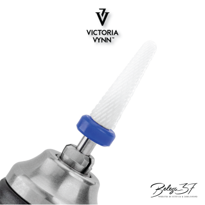 Ferramenta elétrica com broca branca cónica e base metálica com anel azul