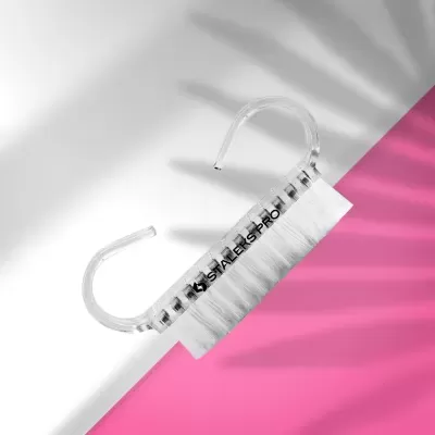 Pincel com cabo transparente e cerdas brancas com texto STAILEKS PRO