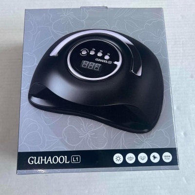 Máquina de manicure preta GUHAOOL L1 na caixa cinza com padrão floral