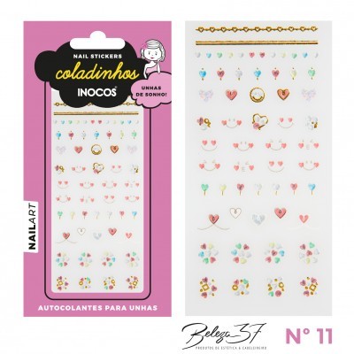 Autocolantes para unhas coloridos com vários desenhos pequenos numa embalagem cor-de-rosa