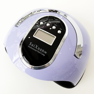 Lâmpada profissional para unhas lilás com visor e botões de controle.