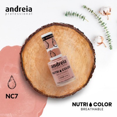 Verniz unhas andreia professional NUTRI COLOR NC7 sobre base de madeira com ramos verdes e algodão