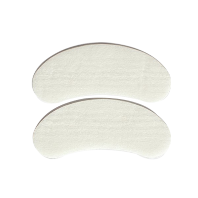 Duas almofadas brancas arqueadas em fundo branco