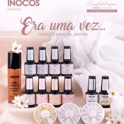 Conjunto de cosméticos INOCOS para noivas com vernizes e decoração sobre tecido bege