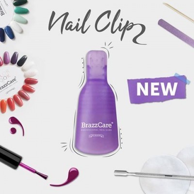 Produto Nail Clip roxo BrazzCare com acessórios de manicure ao redor