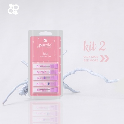 Pack de cinco produtos Purple em embalagem rosa e transparente com galho branco ao fundo