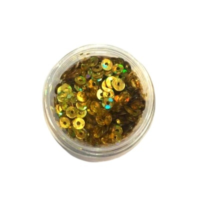 Frasco com lantejoulas douradas redondas e brilhantes