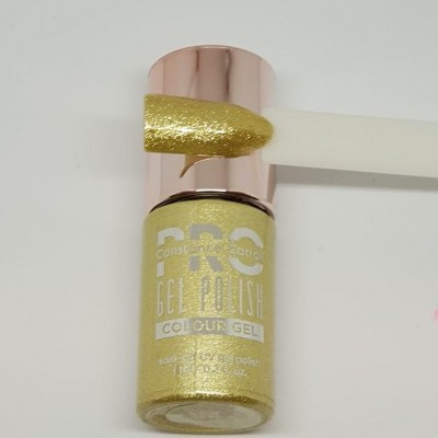 Frasco de verniz em gel dourado com tampa rosada e aplicador glitter