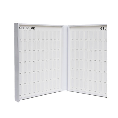 Caixa branca aberta com amostras de gel colorido numeradas.