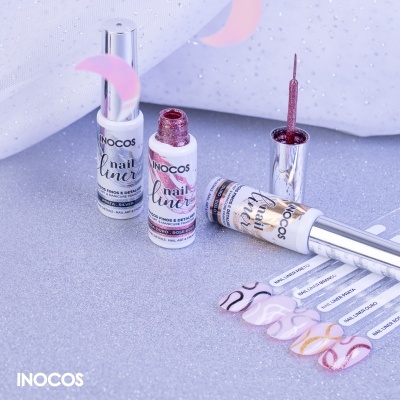 Delineadores para unhas INOCOS com amostras coloridas sobre fundo prateado