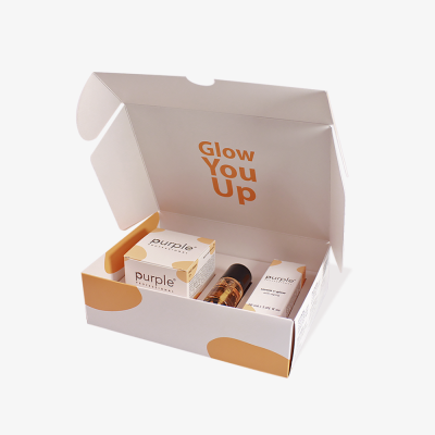Kit Purple Professional em caixa branca com detalhes laranja e texto Glow You Up