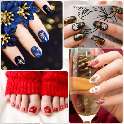 Unhas decoradas com diferentes esmaltes e desenhos de estrelas douradas e brilhos.