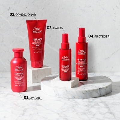 Conjunto de produtos Wella Ultimate Repair vermelhos sobre bases de mármore com instruções numeradas em português.