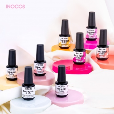 Frascos de verniz gel Inocos Top Coat Milky e Ultra em bases coloridas com fundo branco