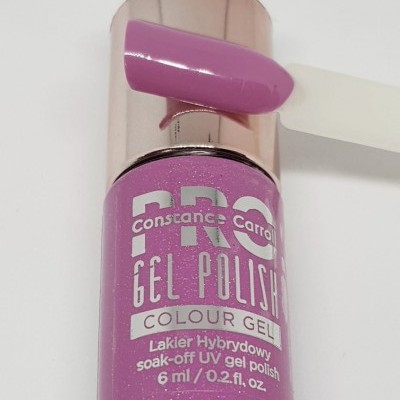 Frasco de verniz de gel rosa brilho Constance Carroll com amostra da cor ao lado