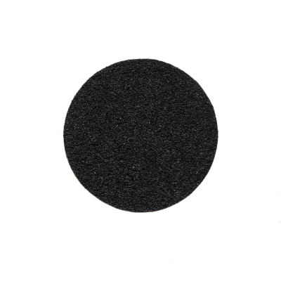 Disco abrasivo preto circular sobre fundo branco com texto SAUTE NAILS®.