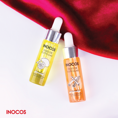 Duas embalagens de óleo de cutículas INOCOS amarelo e laranja com conta-gotas