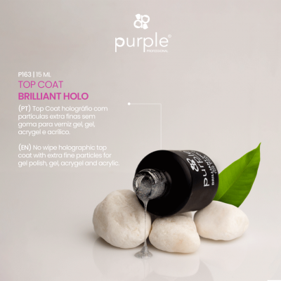 Frasco preto de verniz holográfico a derramar sobre pedras brancas e folha verde