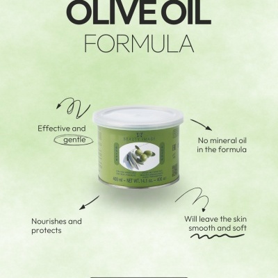 Frasco de creme verde com tampa branca e texto OLIVE OIL FORMULA