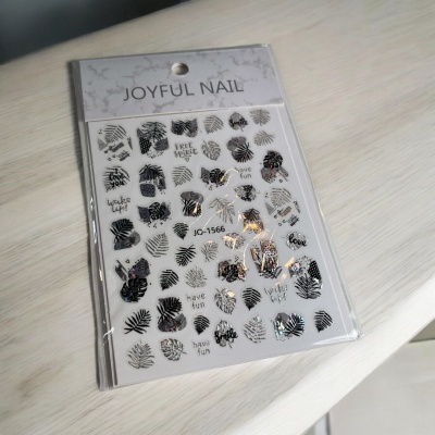 Autocolantes para unhas JOYFUL NAIL com desenhos pretos e palavras em fundo branco